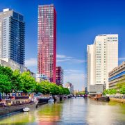 Canal running through modern skyline of Rotterdam